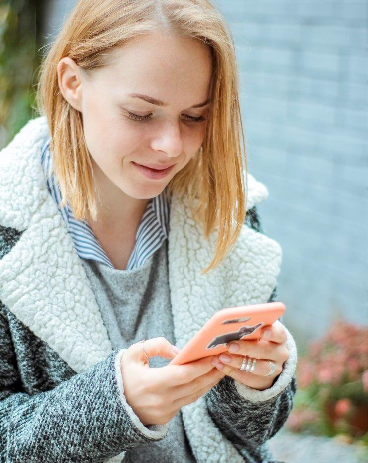 a woman looking at her phone