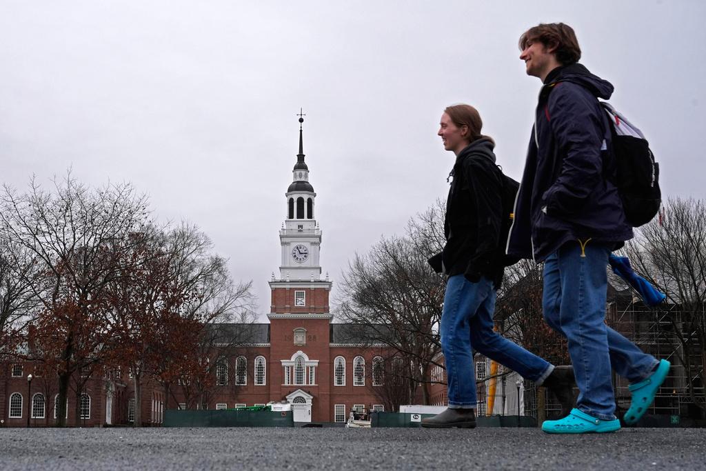 Students cross the campus of Dartmouth College in Hanover, N.H.