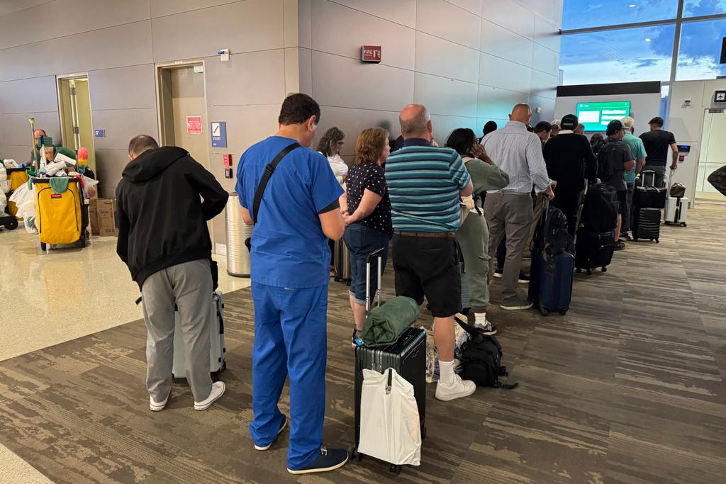 people in line at airport 