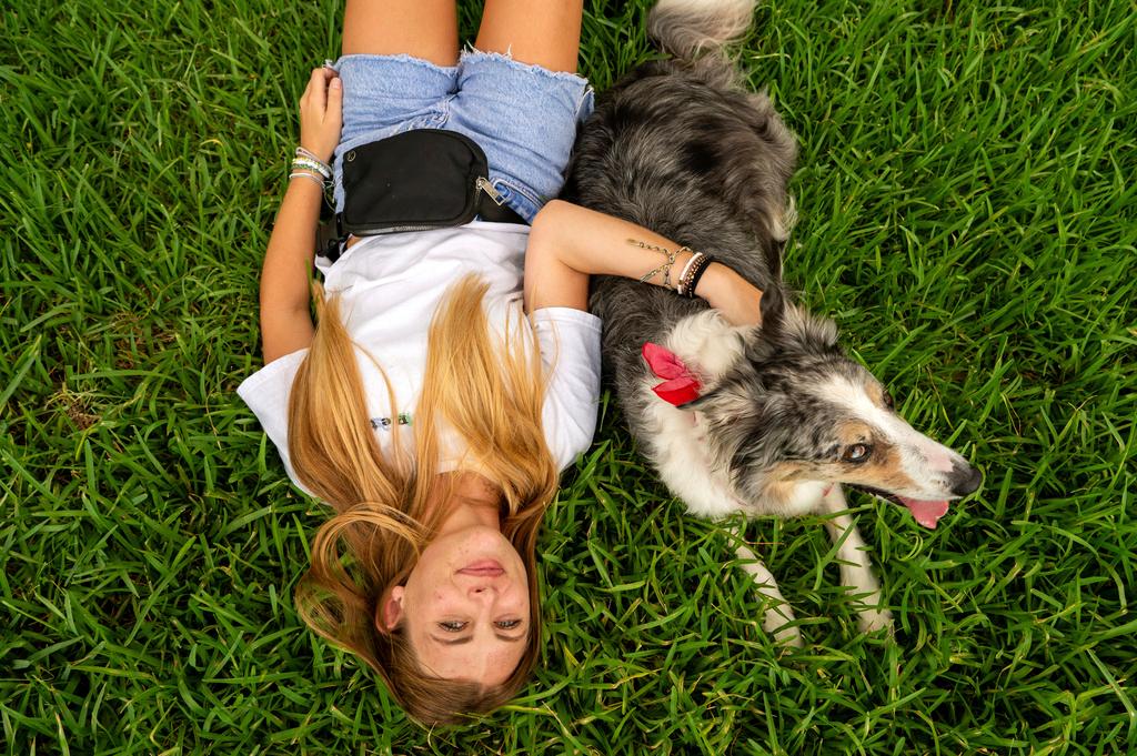 Sophie Nocera, 21, a senior at Eckerd College, with her dog Zuco
