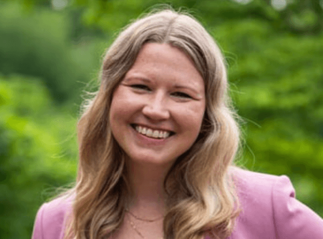 Woman smiling with blond hair