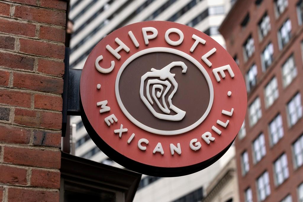 The Chipotle Mexican Grill logo is seen on a storefront, in Boston. 