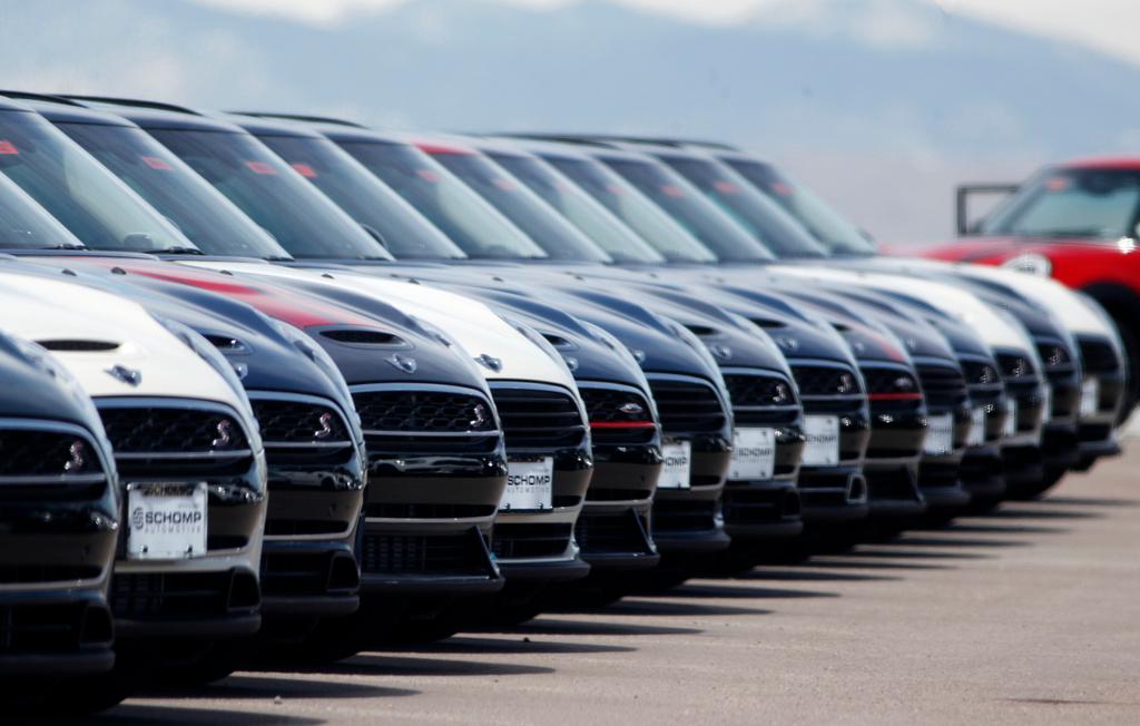 A line of unsold 2018 Cooper Clubmen sit in a long row at a Mini dealership, March 30, 2018, in Highlands Ranch, Colo. Lawmakers on Capitol Hill are pushing to keep AM radio in the nation's cars. A bipartisan group in Congress on Wednesday, May 17, 2023, introduced the “AM for Every Vehicle Act." The bill calls on the National Highway Traffic Safety Administration to require automakers to keep AM radio in new cars at no additional cost.