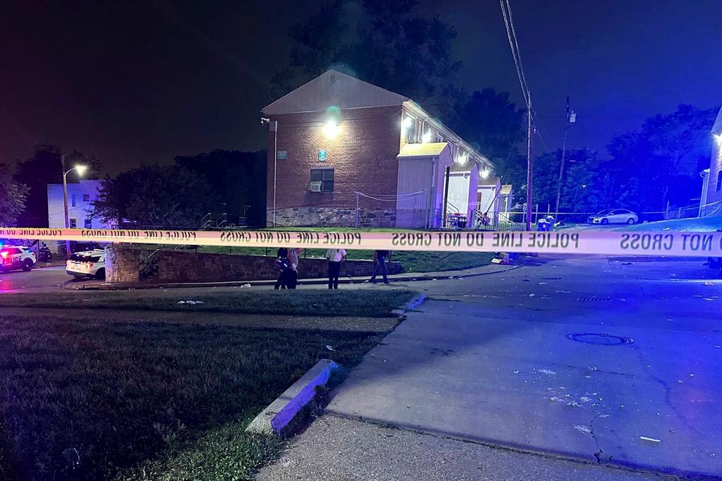 n this photo released by the Baltimore Police Department, police tape cordons off the area of a mass shooting incident in the Southern District of Baltimore, Maryland, early Sunday, July 2, 2023. 