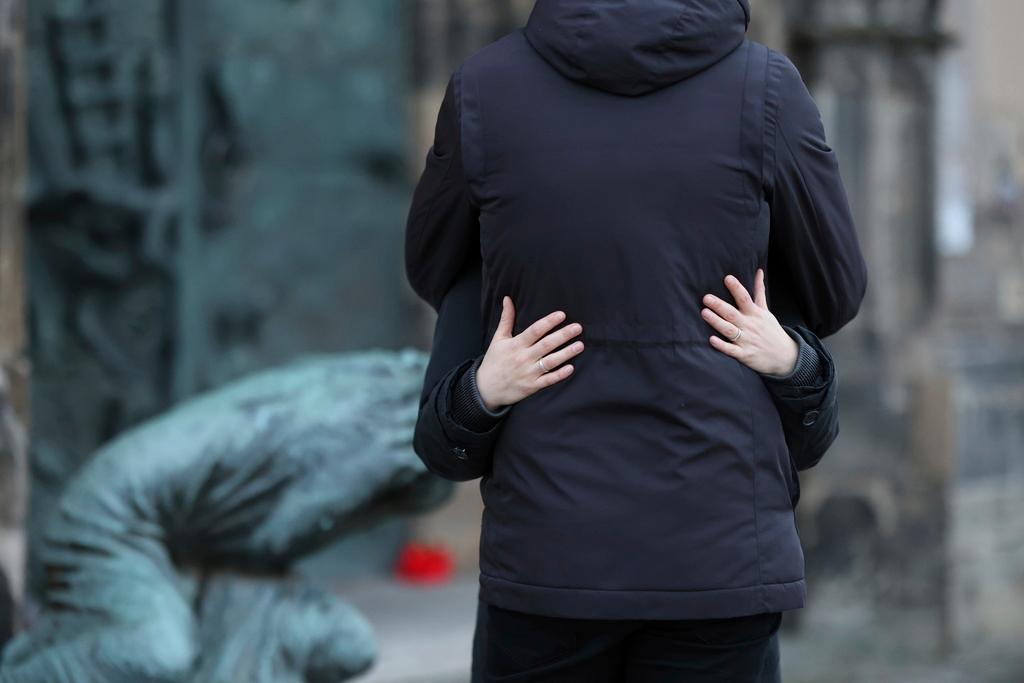 A Berlin church choir sang Amazing Grace, offering their prayers and solidarity with the victims