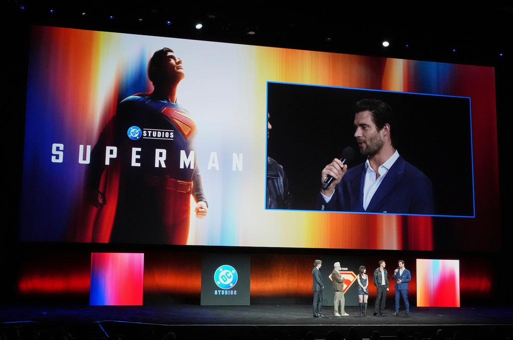 David Corenswet, star of the upcoming film "Superman," is pictured on a video screen discussing the role alongside fellow cast members and filmmakers during the Warner Bros. Pictures presentation at CinemaCon