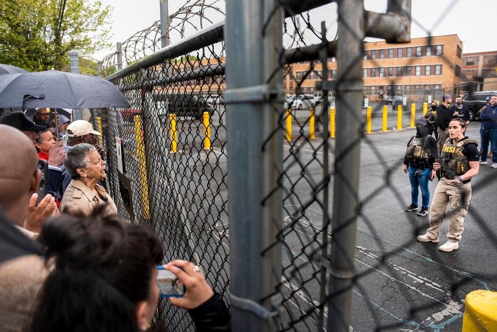 Rep. Bonnie Watson Coleman, D-N.J., speaks with an officer demanding she be let into the ICE Detention office after the arrest of Newark Mayor Ras Baraka