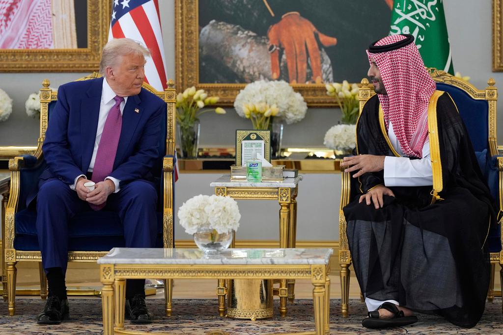 President Donald Trump speaks with Saudi Crown Prince Mohammed bin Salman during a coffee ceremony at the Royal Terminal of King Khalid International Airport in Riyadh