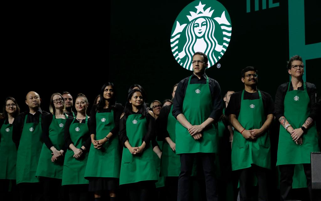 Under the previous dress code, baristas could wear a broader range of dark colors and patterned shirts. 