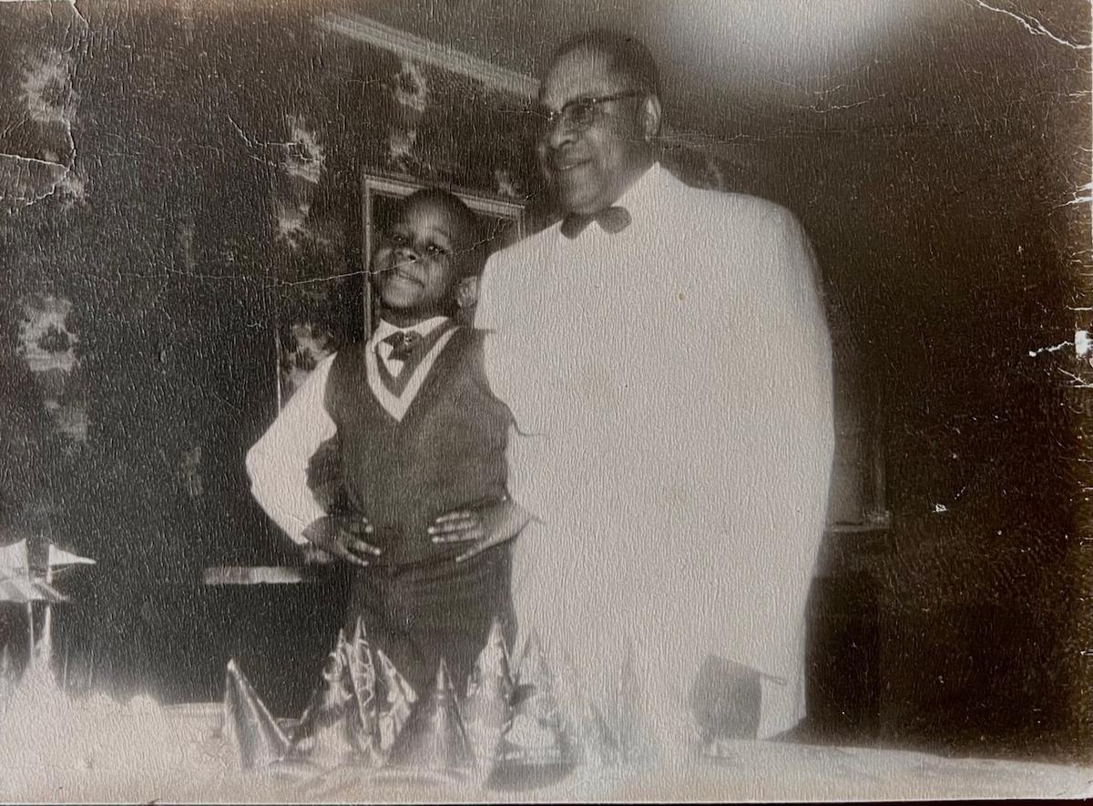 AL.com columnist Roy S. Johnson with father (also Roy) at 7th birthday party.