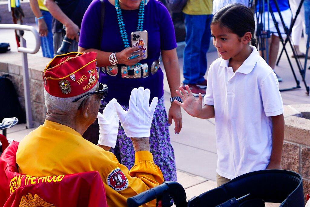 Navajo Code Talker Thomas Begay waves prior to the Arizona State Navajo Code Talkers Day celebration