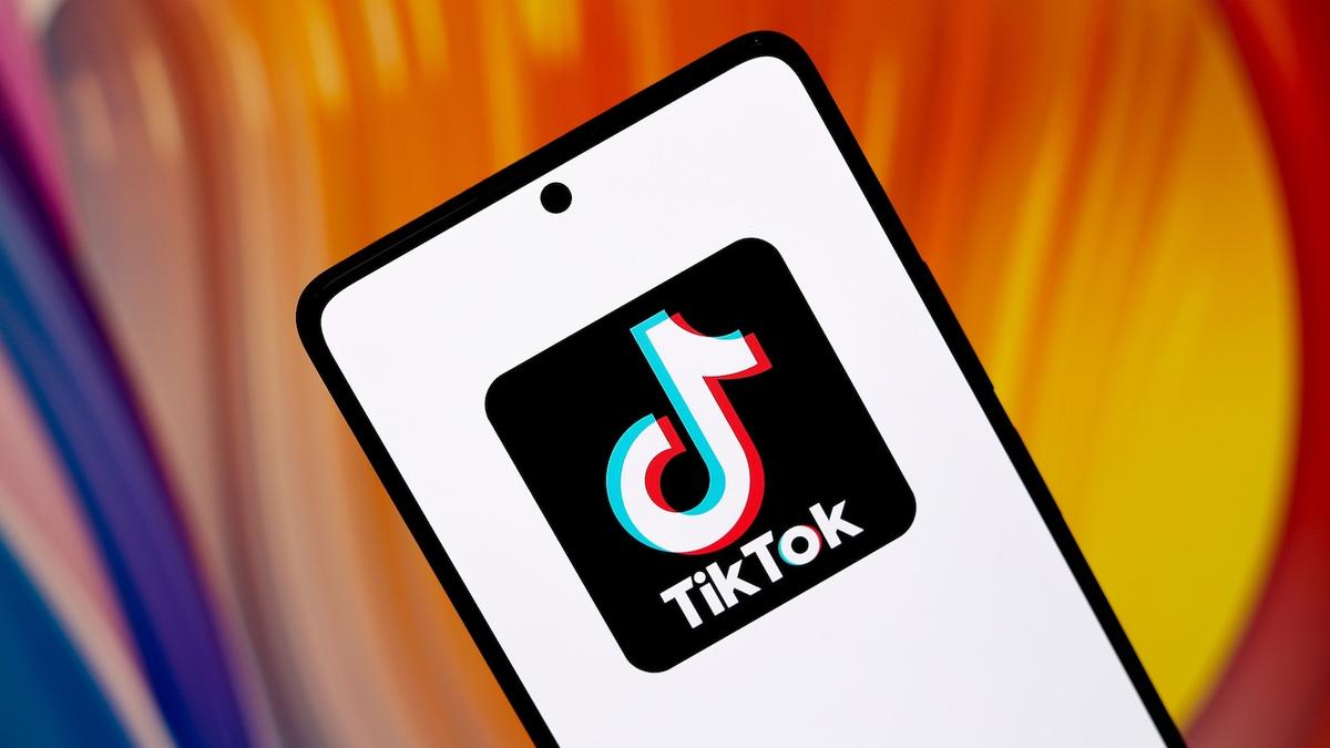 TikTok logo on cell phone