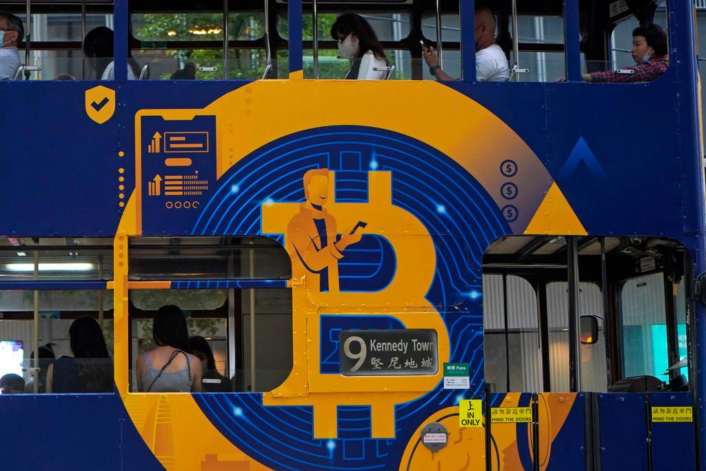 An advertisement for the cryptocurrency Bitcoin displayed on a tram