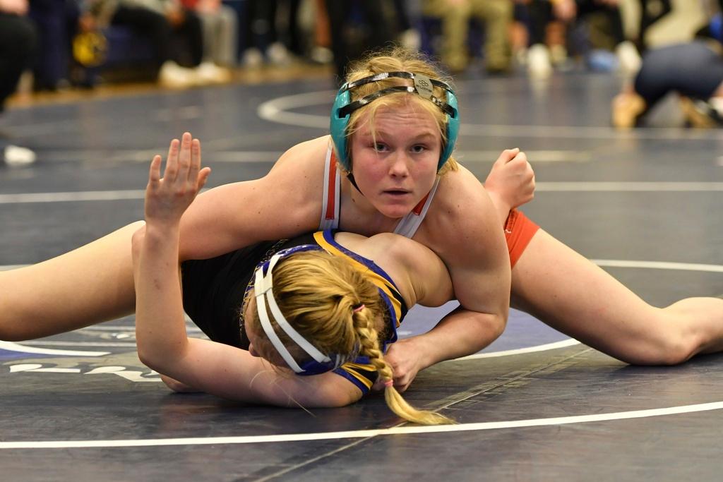 Easton Area High School wrestler Aubre Krazer, top, competes in a semifinal match during the Southeast Regional wrestling tournament in Quakertown, Pa. 