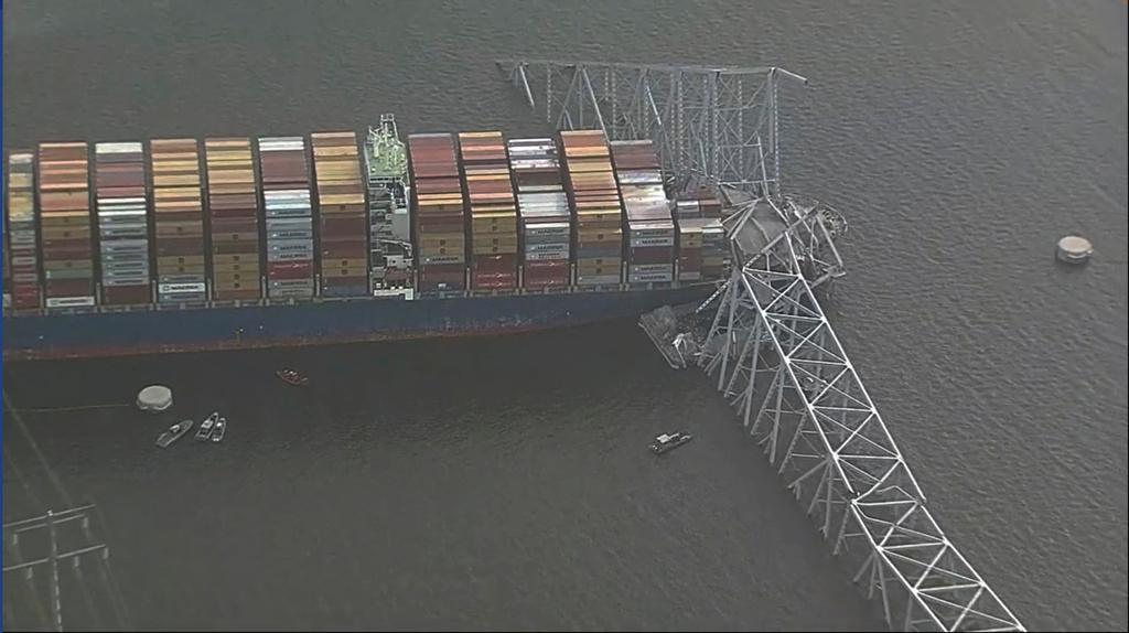Parts of the Francis Scott Key Bridge remain after a container ship collided with one of the bridge’s support 